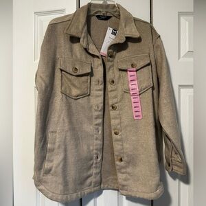 Women’s tan button up shacket.